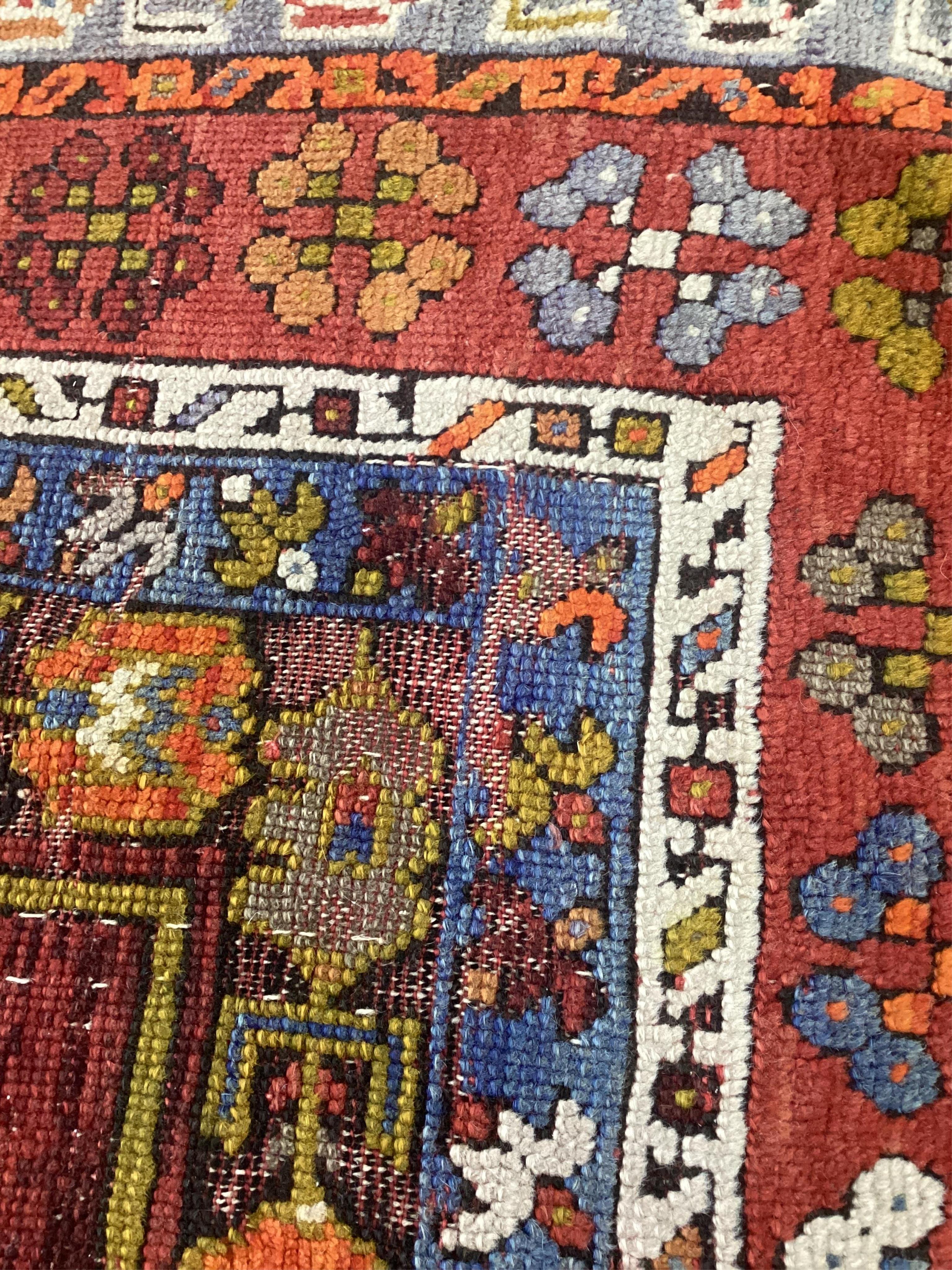 A Turkish prayer rug, 170 x 116cm. Condition - poor